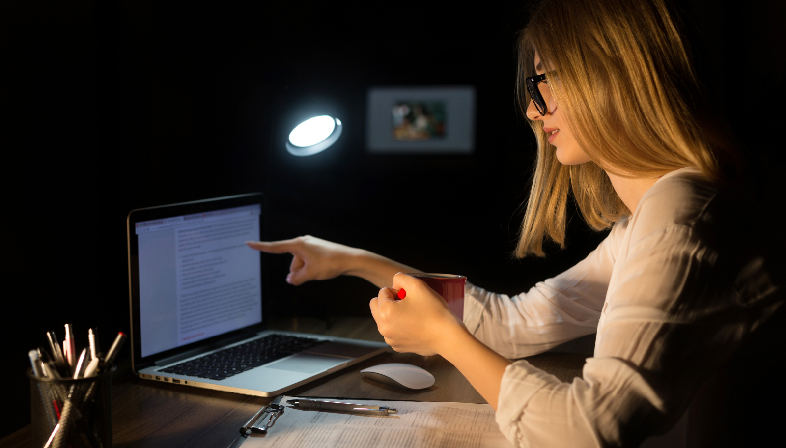 Professional reviewing an AI-drafted follow-up email that references the conversation.